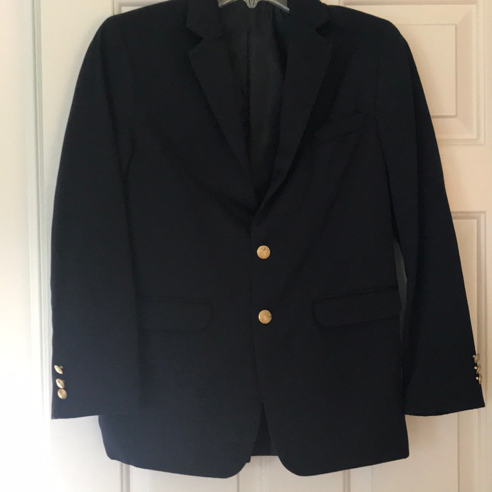 Boys blue blazer with gold button detail.